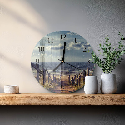 Orologio rotondo spiaggia mare