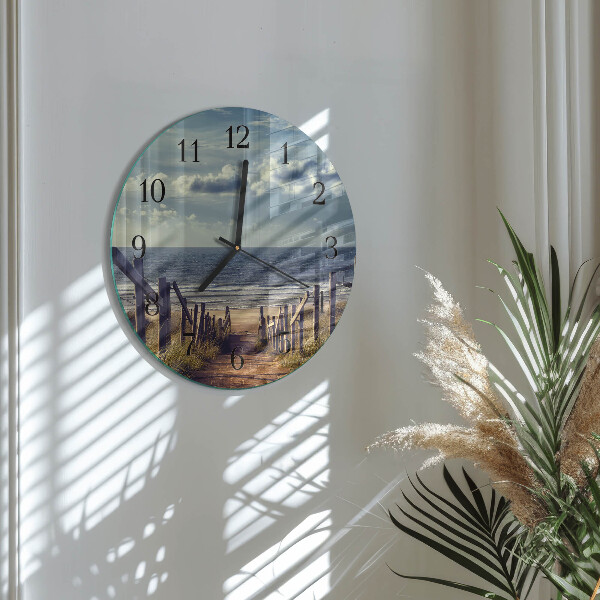 Orologio rotondo spiaggia mare