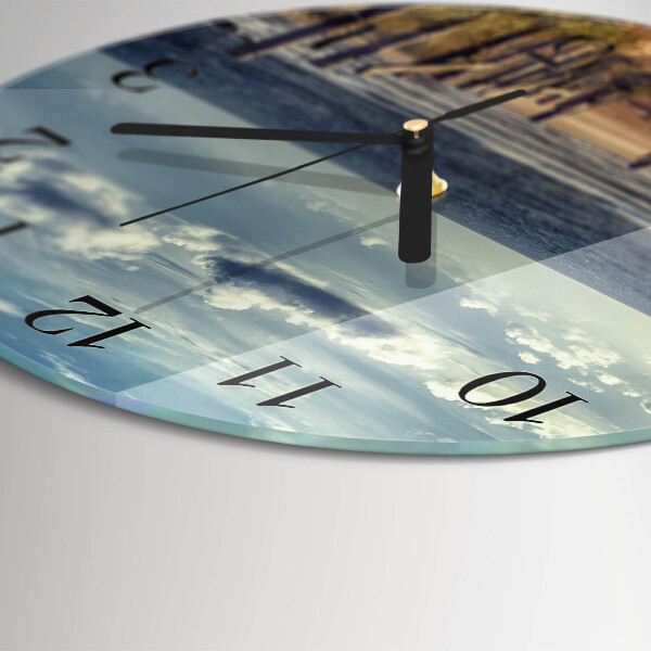 Orologio rotondo spiaggia mare